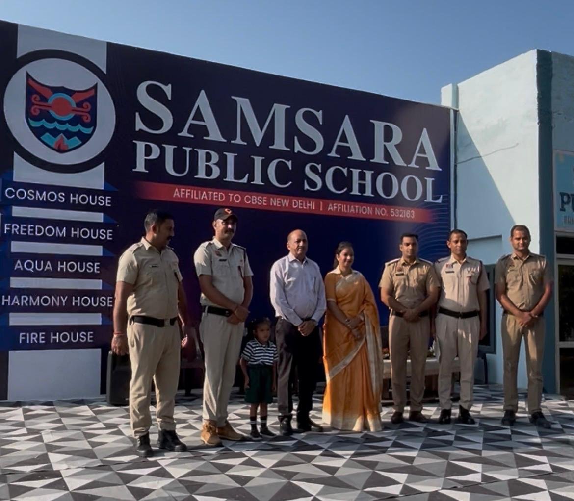Fire safety mock drill conducted by the Fire Department at Samsara Public School, Shekhukheda; students shown fire-extinguishing techniques.ाा